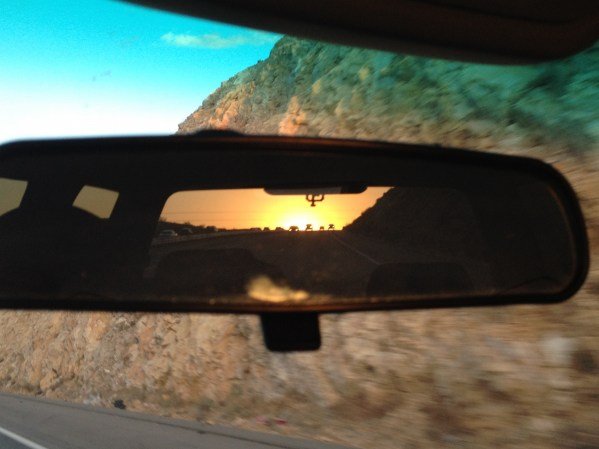 I'm seein' nothin' but my dreams comin' true while I'm staring at the world through my rearview. 