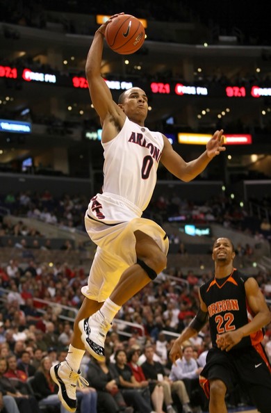 Jerryd Bayless wearing the Jordan 11 Concord (or DMP?) as an Arizona Wildcat.