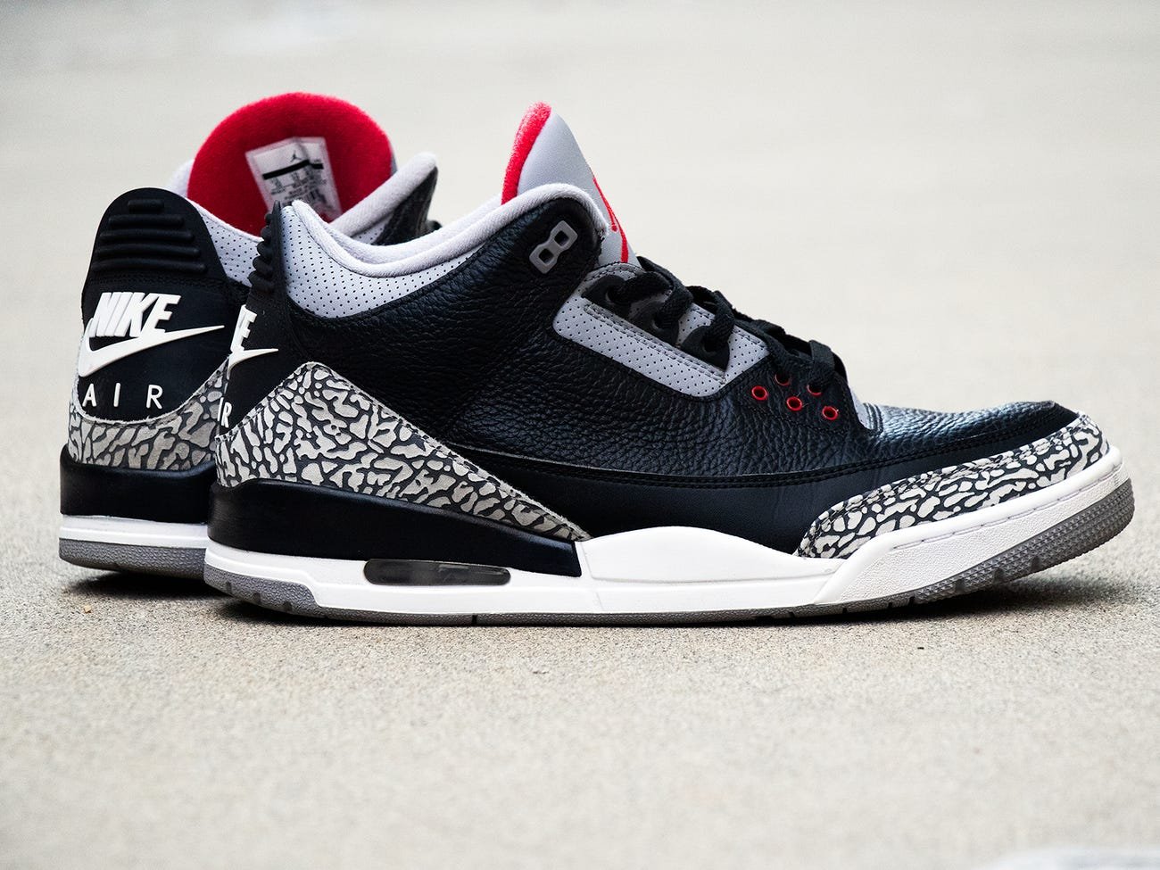 Air Jordan 3 Black Cement with Nike Air branding, 2018.