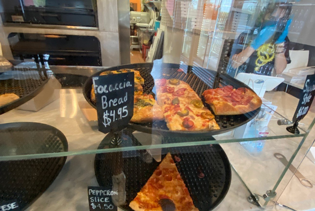 Pizza by the slice at Verrazzano Pizza in Half Moon Bay